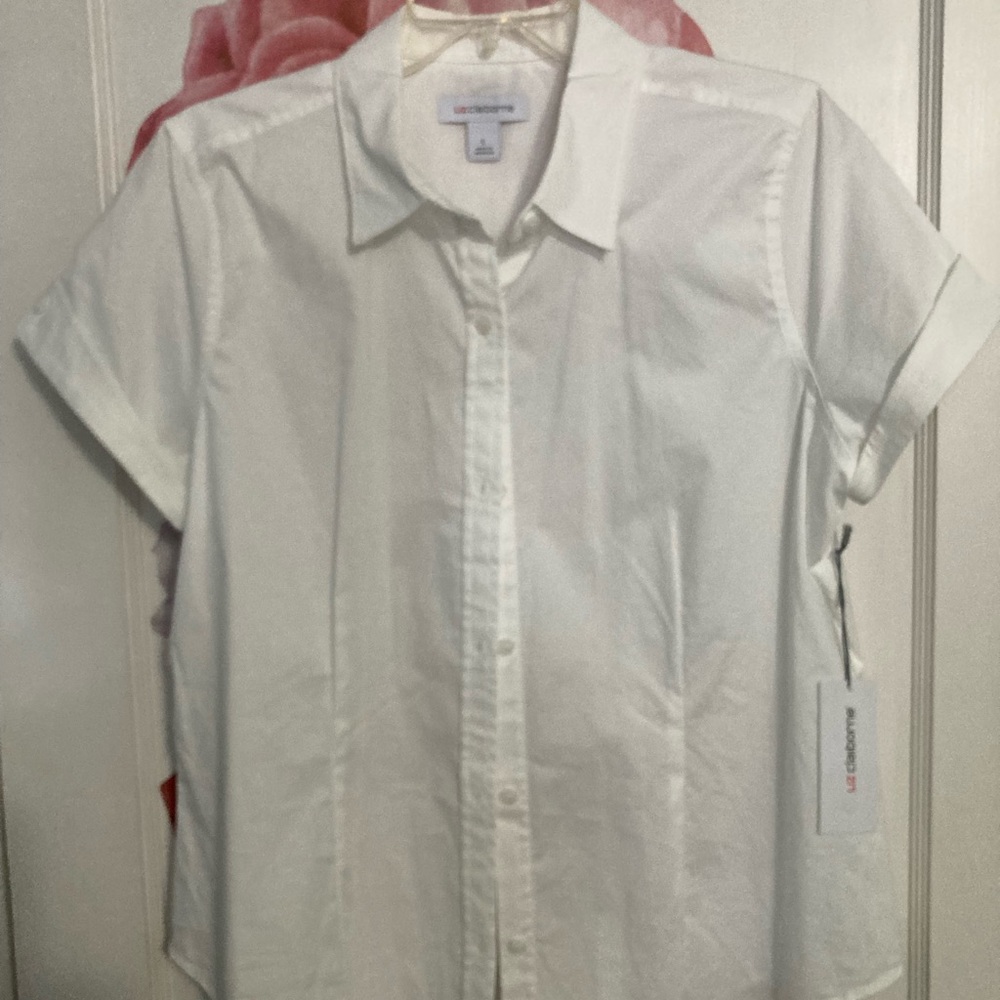 White short sleeve button up shirt.